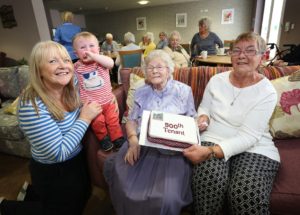 Joan Toward with daughters Angela and Eileen and great grandson Zack